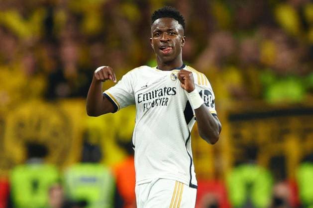 Vinicius Junior of Real Madrid points to the Real Madrid badge on their shirt Borussia Dortmund v Real Madrid, UEFA Champions League, Final, Football, Wembley Stadium, London, UK - 01 June 2024 EDITORIAL USE ONLY No use with unauthorised audio, video, data, fixture lists, club league logos or live services. Online in-match use limited to 120 images, no video emulation. No use in betting, games or single club league player publications.  Copyright: xKieranxMcManus Shutterstockx 14516313cx