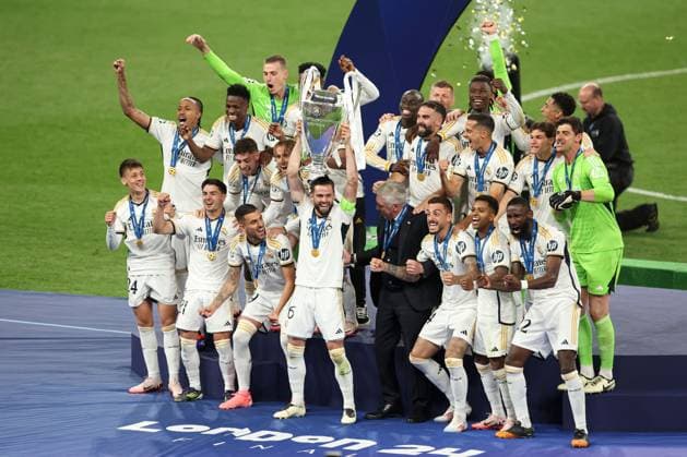 Real Madrid lift the Champions League trophy Borussia Dortmund v Real Madrid, UEFA Champions League, Final, Football, Wembley Stadium, London, UK - 01 June 2024 EDITORIAL USE ONLY No use with unauthorised audio, video, data, fixture lists, club league logos or live services. Online in-match use limited to 120 images, no video emulation. No use in betting, games or single club league player publications.  Copyright: xPaulxCurrie Shutterstockx 14516316fa