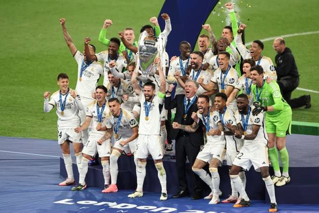 Real Madrid lift the Champions League trophy Borussia Dortmund v Real Madrid, UEFA Champions League, Final, Football, Wembley Stadium, London, UK - 01 June 2024 EDITORIAL USE ONLY No use with unauthorised audio, video, data, fixture lists, club league logos or live services. Online in-match use limited to 120 images, no video emulation. No use in betting, games or single club league player publications.  Copyright: xPaulxCurrie Shutterstockx 14516316fb
