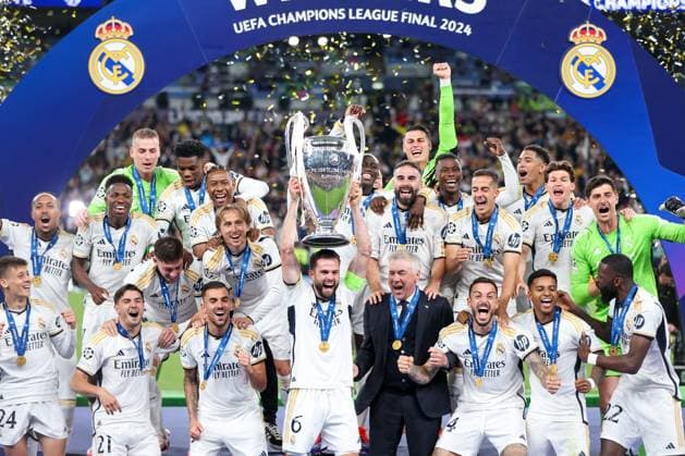 Borussia Dortmund v Real Madrid CF - UEFA Champions League Final 2023 24 LONDON, ENGLAND - JUNE 1: Luka Modric of Real Madrid lifts the UEFA Champions League Trophy after his team s victory during the UEFA Champions League 2023 24 Final match between Borussia Dortmund and Real Madrid CF at Wembley Stadium on June 01, 2024 in London, England. SanjinxStrukic PIXSELL