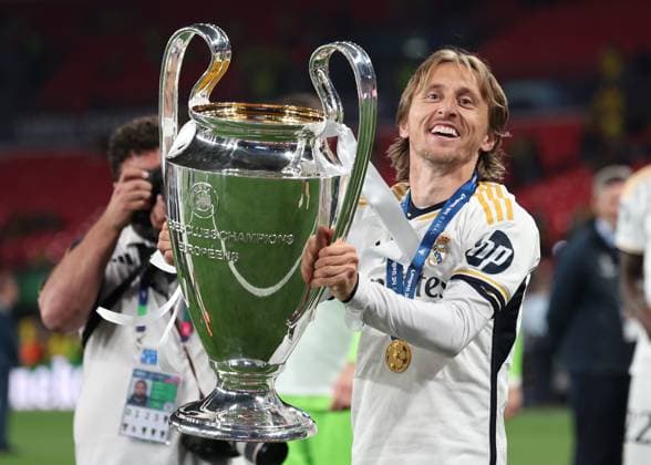 London, England, 1st June 2024. Luka Modric of Real Madrid celebrates with the trophy during the UEFA Champions League final match at Wembley Stadium, London. Picture credit should read: David Klein Sportimage EDITORIAL USE ONLY. No use with unauthorised audio, video, data, fixture lists, club league logos or live services. Online in-match use limited to 120 images, no video emulation. No use in betting, games or single club league player publications. SPI-3169-0133