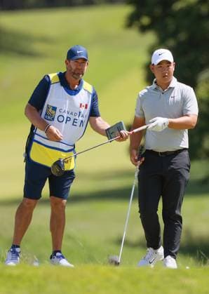 RBC Canadian Open Tom Kim of Seoul, Republic of Korea exchanges clubs with his caddie before hitting from the 15th tee during the third round of the RBC Canadian Open at Hamilton Golf & Country Club in Ancaster, Ontario, Canada, on Saturday, June 1, 2024. Ancaster Ontario United States  Copyright: xAmyxLemusx originalFilename:lemus-rbccanad240601_np3IJ.jpg