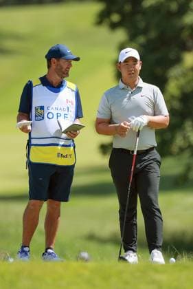 RBC Canadian Open Tom Kim of Seoul, Republic of Korea talks with his caddie before hitting from the 15th tee during the third round of the RBC Canadian Open at Hamilton Golf & Country Club in Ancaster, Ontario, Canada, on Saturday, June 1, 2024. Ancaster Ontario United States  Copyright: xAmyxLemusx originalFilename:lemus-rbccanad240601_npkGO.jpg