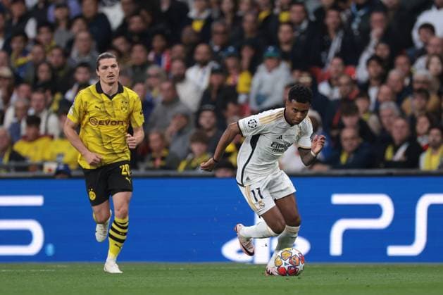 London, England, 1st June 2024. Marcel Sabitzer of Borussia Dortmund lookso n as Rodrygo of Real Madrid breaks withj the ball during the UEFA Champions League match at Wembley Stadium, London. Picture credit should read: Jonathan Moscrop Sportimage EDITORIAL USE ONLY. No use with unauthorised audio, video, data, fixture lists, club league logos or live services. Online in-match use limited to 120 images, no video emulation. No use in betting, games or single club league player publications. SPI-3168-0040