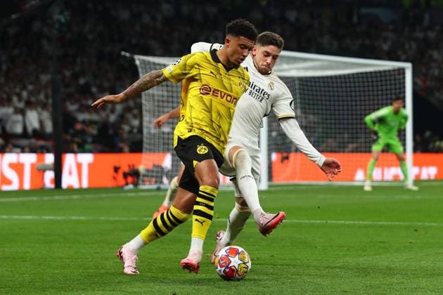 Borussia Dortmund v Real Madrid, London, UK - 1 Jun 2024 Jadon Sancho of Borussia Dortmund is pressured by Federico Valverde of Real Madrid during the UEFA Champions League Final match between Borussia Dortmund and Real Madrid at Wembley Stadium, London on 1 June 2024 ( London Wembley Stadium London England Copyright: xMicahxCrook PPAUKx PPA-119980