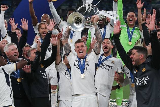 UEFA Champions League Final 2024 Borussia Dortmund Real Madrid on 01 06 2024 at Wembley Stadium in London Real Madrid is Champions League winner, here Toni Kroos Real Madrid 8 holds up the trophy and cheers with the team MH