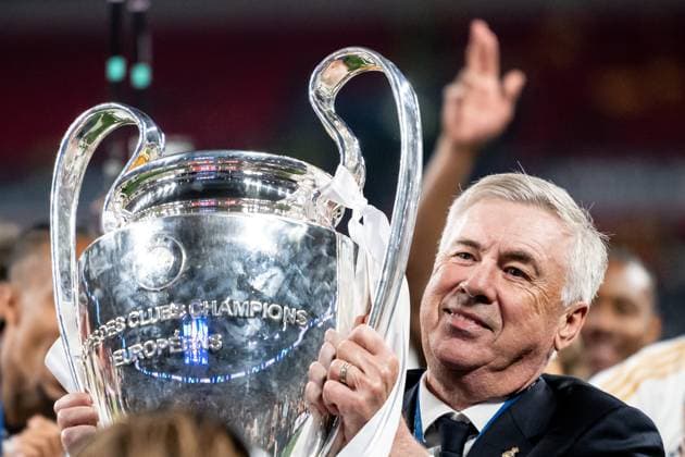 240601 Head coach Carlo Ancelotti of Real Madrid celebrates with the trophy after the UEFA Champions League final between Dortmund and Real Madrid on June 1, 2024 in London Photo Petter Arvidson BILDBYRAN kod PA PA0818 fotboll football soccer fotball champions league final dortmund real madrid bbeng jubel  Copyright: PETTERxARVIDSON BB240601PA335
