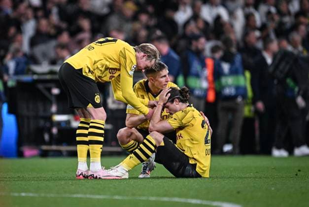 Football CHL FINAL 2023 2024 Final in London 01 06 2024 Borussia Dortmund Real Madrid Disappointment Borussia Dortmund Julian Brandt, Nico Schlotterbeck and Marcel Sabitzer from left after the match