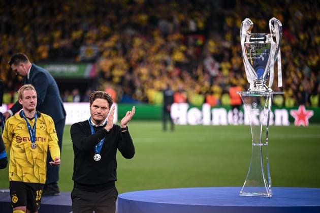 Football CHL FINAL 2023 2024 Final in London 01 06 2024 Borussia Dortmund Real Madrid award ceremony, coach Edin Terzic center and Julian Brandt left, both Borussia Dortmund walk disappointed past the CHL cup