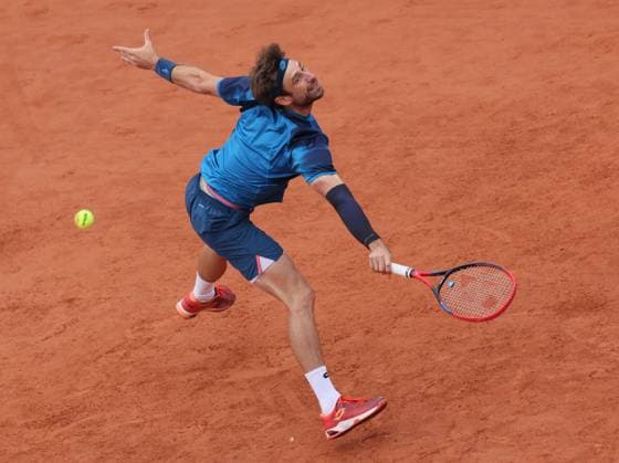 Belgian Sander Gille pictured in action during a tennis match between Belgian pair Gille Vliegen and Australian-Russian pair Peers Safiullin, in the second round of the men s doubles, at the Roland Garros French Open tennis tournament, in Paris, France, Sunday 02 June 2024. This year s tournament takes place from 26 May to 09 June. BENOITxDOPPAGNE  x93827343x