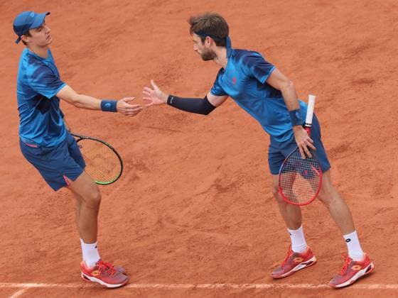 Belgian Joran Vliegen and Belgian Sander Gille react during a tennis match between Belgian pair Gille Vliegen and Australian-Russian pair Peers Safiullin, in the second round of the men s doubles, at the Roland Garros French Open tennis tournament, in Paris, France, Sunday 02 June 2024. This year s tournament takes place from 26 May to 09 June. BENOITxDOPPAGNE  x93827562x
