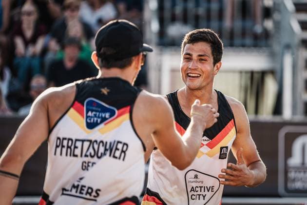 Beach volleyball men Queen and King of the Court Hamburg 01 06 2024 Sven Winter right is happy with Lukas Pfretzschner left Hamburg Active City Arena Heiligengeistf Hamburg Germany
