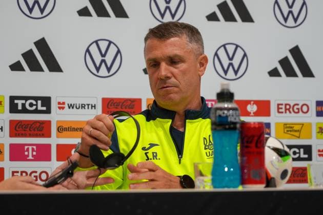 Coach Segiy Rebrov Ukraine gets headphones for translation Herzo Base 02 06 2024 Press conference Ukraine, Home Ground World of Adidas, Herzogenaurach