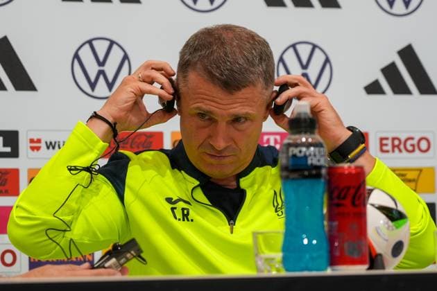 Coach Segiy Rebrov Ukraine gets headphones for translation Herzo Base 02 06 2024 Press conference Ukraine, Home Ground World of Adidas, Herzogenaurach