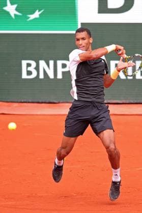 2nd June 2024; Roland Garros, Paris, France; 2024 French Open Tennis tournament, Day 8; Felix Auger-Aliassime returns to Carlos Alcaraz in third round action  ActionPlus12650397 JonxBromley