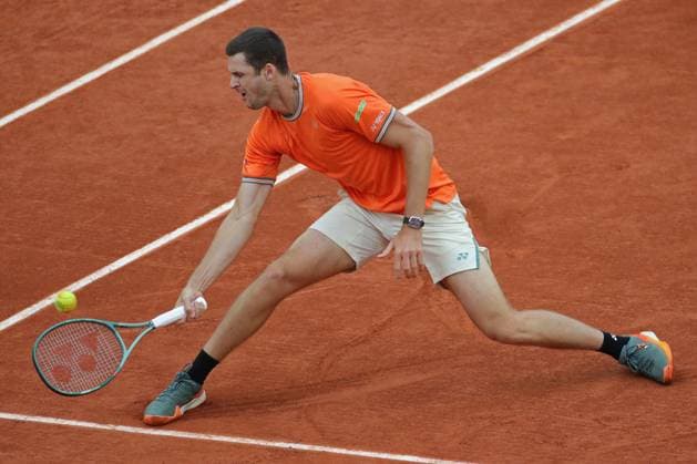 2nd June 2024; Roland Garros, Paris, France; 2024 French Open Tennis tournament, Day 8; Hubert Hurkacz picks up a drop from Grigor Dimitrov  ActionPlus12650479 JonxBromley