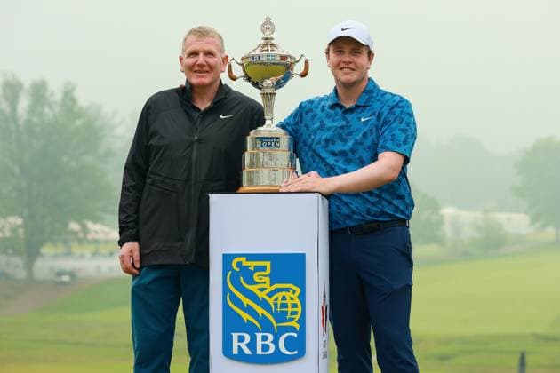 RBC Canadian Open Robert MacIntyre of Scotland stands next to the trophy with his father who was his caddie during the award ceremony at the conclusion of the RBC Canadian Open at Hamilton Golf & Country Club in Ancaster, Ontario, Canada, on Sunday, June 2, 2024.Ro Ancaster Ontario United States  Copyright: xAmyxLemusx originalFilename:lemus-rbccanad240602_npVT7.jpg
