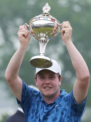 June 2, 2024, Hamilton, On, CANADA: Scotland s Robert MacIntyre celebrates while holding the championship trophy after winning the Canadian Open golf tournament in Hamilton, Ontario on Sunday June 2, 2024. Canada News - June 2, 2024  - ZUMAc35_ 20240602_zaf_c35_118 Copyright: xNathanxDenettex