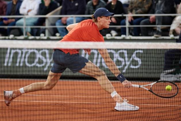 (240603) -- PARIS, June 3, 2024 -- Jannik Sinner hits a return during the men s singles fourth round match between Jannik Sinner of Italy and Corentin Moutet of France at the French Open tennis tournament at Roland Garros in Paris, France, June 2, 2024. ) (SP)FRANCE-PARIS-TENNIS-FRENCH OPEN-MEN S SINGLES MengxDingbo 