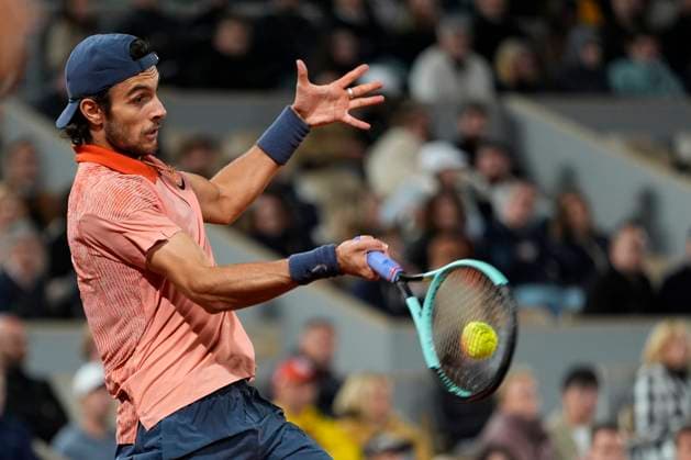 PARIS, FRANCE - JUNE 2: Lorenzo Musetti of Italy returns during the round of 8 of match between Novak Djokovic vs Lorenzo Musetti at Roland Garros Stadium on June 2, 2024 in Paris, France. (Photo by Glenn Gervot Icon Sportswire) TENNIS: JUN 01 Roland-Garros EDITORIAL USE ONLY Icon20240602130872024