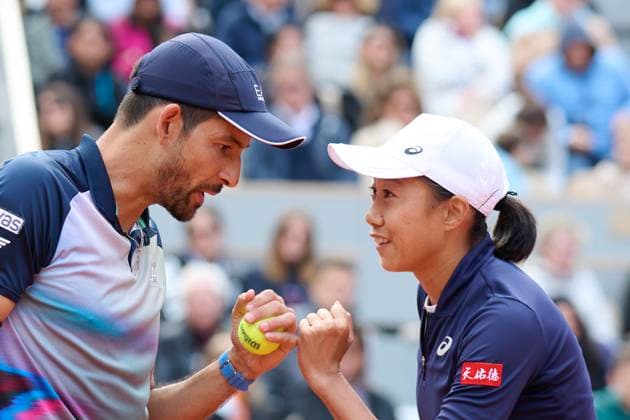 (240603) -- PARIS, June 3, 2024 -- Zhang Shuai (R) Marcelo Arevalo react during the mixed doubles first round match between Zhang Shuai (China) Marcelo Arevalo (El Salvador) and Bethanie Mattek-Sands Austin Krajicek of the United States at the French Open tennis tournament at Roland Garros in Paris, France, June 2, 2024. ) (SP)FRANCE-PARIS-TENNIS-FRENCH OPEN-MIXED DOUBLES MengxDingbo 