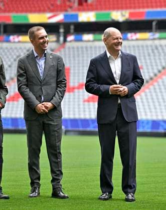 03 06 2024, European Football Championship 2024, Visit by Federal Chancellor Olaf Scholz to the European Championship stadium in Munich Football Arena f l European Championship Ambassador Philipp Lahm and Federal Chancellor Olaf Scholz