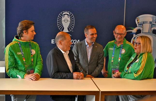 03 06 2024, European Football Championship 2024, Visit by Federal Chancellor Olaf Scholz to the European Championship stadium in Munich Football Arena f l Federal Chancellor Olaf Scholz Germany and European Championship Ambassador Philipp Lahm Germany talk to European Championship volunteers,