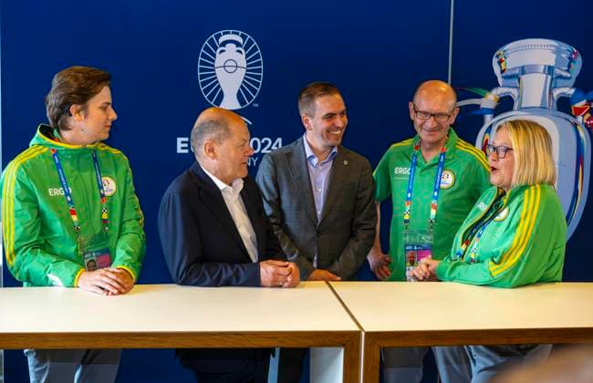 03 06 2024, European Football Championship 2024, visit by Federal Chancellor Olaf Scholz 2 from left in the European Championship stadium Munich Football Arena Here in conversation with a delegation of volunteers and Philipp Lahm 3 from right