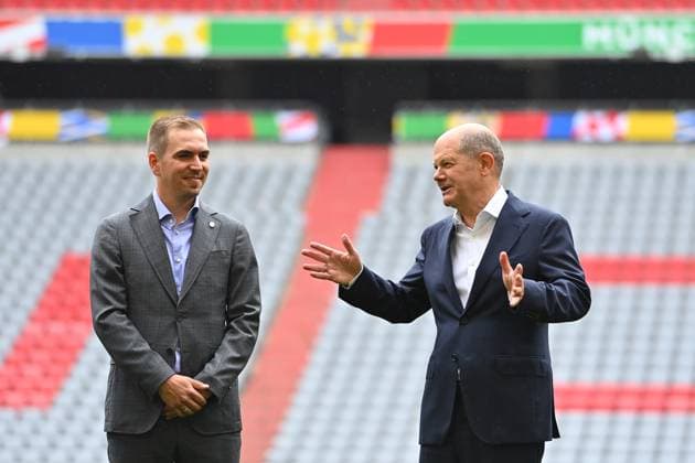 from left Philipp LAHM Turnirdirector of UEFA EURO 2024 , Chancellor Olaf SCHOLZ, Chancellor Olaf Scholz visits the Football Arena Munich on 03 06 2024, Â
