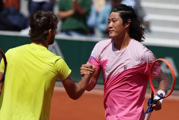(240603) -- PARIS, June 3, 2024 -- Zhang Zhizhen (R) Tomas Machac celebrate their victory after the men s doubles second round match between Zhang Zhizhen (China) Tomas Machac (the Czech Republic) and Robin Haase Botic Van de Zandschulp of the Netherlands at the French Open tennis tournament at Roland Garros in Paris, France, on June 3, 2024. ) (SP)FRANCE-PARIS-TENNIS-FRENCH OPEN-MEN S DOUBLES GaoxJing 