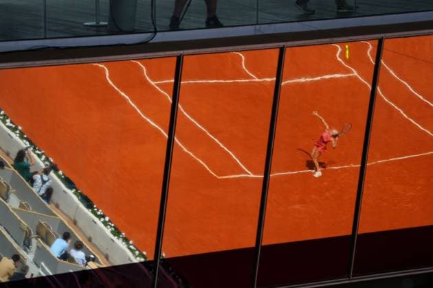 Aryna Sabalenka is reflected in glass as she serves during her fourth round win French Open Tennis, Day 9, Tennis, Roland Garros, Paris, France - 03 June 2024  Copyright: xJavierxGarcia Shutterstockx 14519129ai