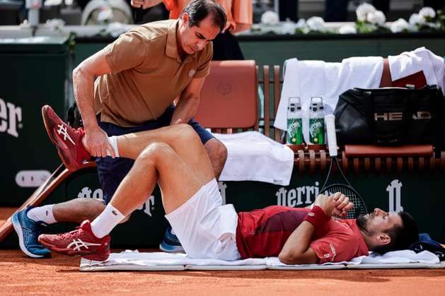 Novak Djokovic of Serbia is assisted by Doctor prior his match against Francisco Cerundolo of Argentina during the Men™s Singles Round of 16 of 2024 French Open Day 9 at Roland Garros on June 3, 2024 in Paris, France Photo by JustPictures Paris Roland Garros France Copyright: x x2024xEurasiaxSportxImagesx jp-en-EuSpIm-AB4_Roland_Garros_03Jun2024_PR926