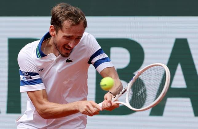 Daniil Medvedev of Russia plays against Alex de Minaur of Australia during their round-of-16 match of the French Tennis Open at Roland Garros in Paris, France, on Monday, June 3, 2024. De Minaur won 4-6, 6-2, 6-1, 6-3 and qualified for the quarter finals.  PAR20240603139139 MAYAxVIDON-WHITE