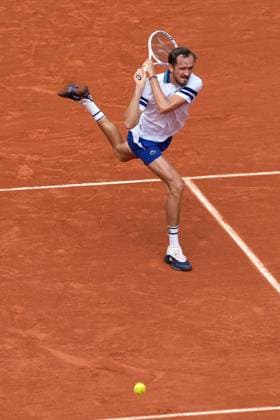 (240604) -- PARIS, June 4, 2024 -- Daniil Medvedev hits a return during the men s singles fourth round match between Daniil Medvedev of Russia and Alex de Minaur of Australia at the French Open tennis tournament at Roland Garros in Paris, France, June 3, 2024. ) (SP)FRANCE-PARIS-TENNIS-FRENCH OPEN-MEN S SINGLES MengxDingbo 