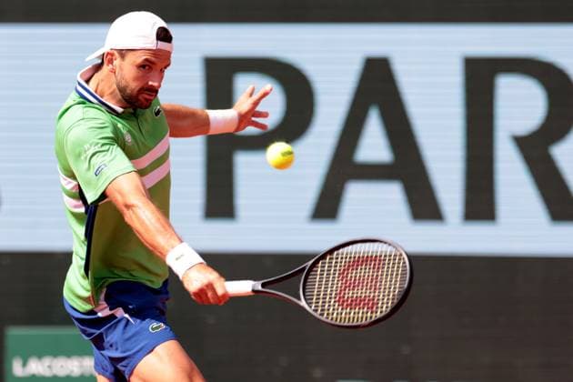 4th June 2024; Roland Garros, Paris, France; 2024 French Open Tennis tournament, Day 10; Grigor Dimitrov (BUL) plays a backhand return to Jannik Sinner (ITA)  ActionPlus12650777 JonxBromley