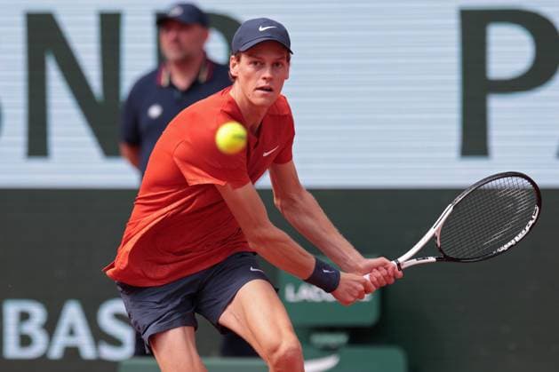 4th June 2024; Roland Garros, Paris, France; 2024 French Open Tennis tournament, Day 10; Jannik Sinner (ITA) plays a backhand return to Grigor Dimitrov (BUL)  ActionPlus12650778 JonxBromley