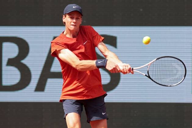 4th June 2024; Roland Garros, Paris, France; 2024 French Open Tennis tournament, Day 10; Jannik Sinner (ITA) plays a backhand return to Grigor Dimitrov (BUL)  ActionPlus12650779 JonxBromley