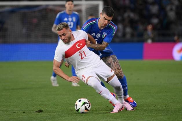 Baris Alper Yilmaz of Turkey and Gianluca Mancini of Italy during a friendly football match between Italy and Turkey at Renato Dall Ara stadium in Bologna (Italy), June 4th, 2024. andreaxstaccioli