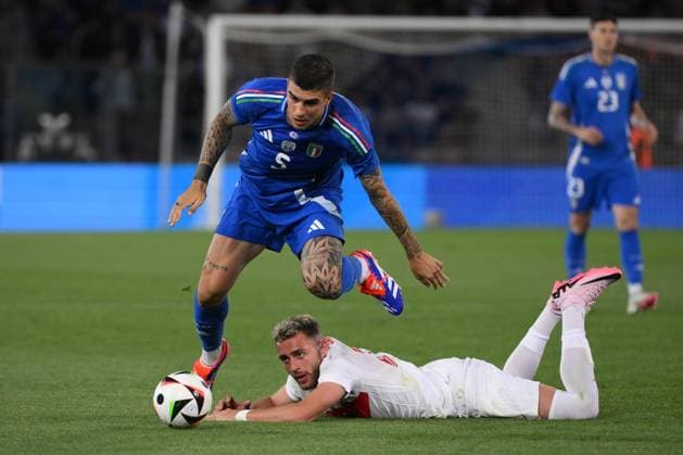 Baris Alper Yilmaz of Turkey and Gianluca Mancini of Italy during a friendly football match between Italy and Turkey at Renato Dall Ara stadium in Bologna (Italy), June 4th, 2024. andreaxstaccioli