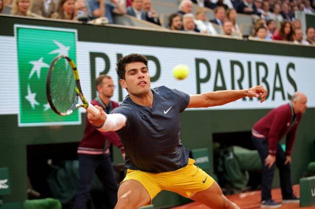 4th June 2024; Roland Garros, Paris, France; 2024 French Open Tennis tournament, Day 10; Carlos Alcaraz (ESP) at full stretch against Stefano Tsitsipas (GRE)  ActionPlus12650920 JonxBromley