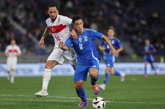 UEFA EUROPEAN FRIENDLY MATCH ITALY VS TURKEY IN BOLOGNA Bologna, Italy 4.06.2024: Giacomo Raspadori of Italy, Hakan Ã‡alhanoÄülu of Turky during Uefa European friendly football match Italy vs Turkey at Stadio Renato Dall™Ara in Bologna. BOLOGNA DALL ARA italy italy Copyright: xmarcoxiacobucci