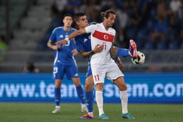 Bologna, Italy, 4th June 2024. Gianluca Mancini of Italy challenges Yusuf Yazici of Turkey during the International Friendly, Länderspiel, Nationalmannschaft match at Stadio Renato Dall Ara, Bologna. Picture credit should read: Jonathan Moscrop Sportimage EDITORIAL USE ONLY. No use with unauthorised audio, video, data, fixture lists, club league logos or live services. Online in-match use limited to 120 images, no video emulation. No use in betting, games or single club league player publications. SPI-3179-0019