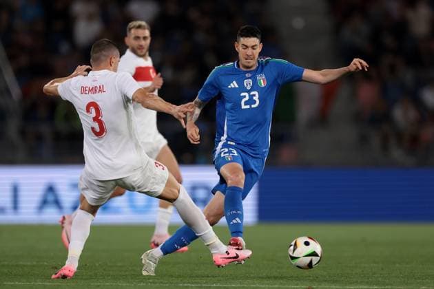 Bologna, Italy, 4th June 2024. Merih Demiral of Turkey challenges Alessandro Bastoni of Italy during the International Friendly, Länderspiel, Nationalmannschaft match at Stadio Renato Dall Ara, Bologna. Picture credit should read: Jonathan Moscrop Sportimage EDITORIAL USE ONLY. No use with unauthorised audio, video, data, fixture lists, club league logos or live services. Online in-match use limited to 120 images, no video emulation. No use in betting, games or single club league player publications. SPI-3179-0060