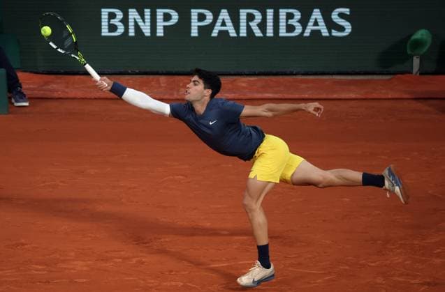 Carlos Alcaraz of Spain plays against Stefanos Tsitsipas of Greece during their quarter final match of the French Tennis Open at Roland Garros in Paris, France, on Tuesday, June 4, 2024. Alcaraz won 6-3, 7-6, 6-4.  PAR20240604111 MAYAxVIDON-WHITE