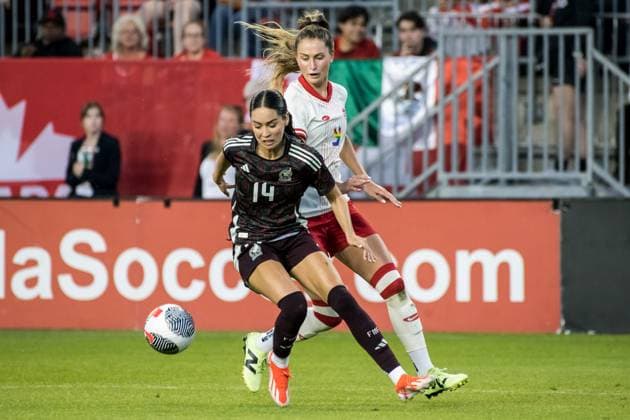 Canada Vs Mexico in Toronto, Canada - 04 Jun 2024 Jordyn Huitema 9 (R) of Canada and Greta Espinoza 14 (L) of Mexico in action during an International Friendly, Länderspiel, Nationalmannschaft match at BMO Field. The game ended 1-1. Toronto Canada Copyright: xAngelxMarchinix xSOPAxImagesx CanadavMexico-04-06-2024-7002
