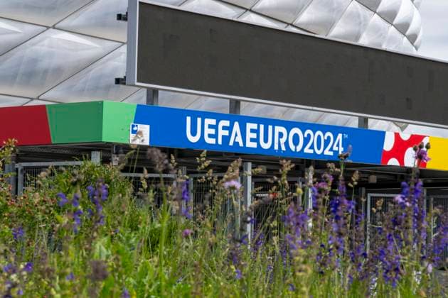 30 05 2024, European Football Championship 2024, The European Championship Stadium Munich Football Arena, this is the name of the Allianz Arena Munich during the European Championship, the original name has already been removed from the facade Flowers bloom on the esplanade