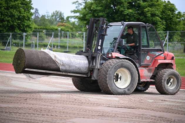 Football International EURO 2024 05 06 2024 At the Hermann Saam Stadium in Freudenstadt, the company Sportstaettenbau Garten Moser from Reutlingen is laying turf 6 days before the first training session of the Danish national team Delivery of the turf bales