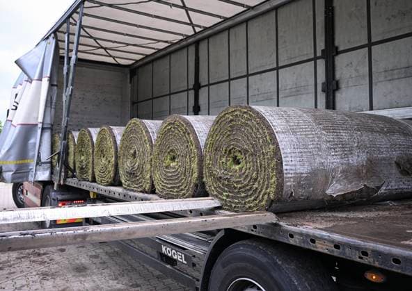 Football International EURO 2024 05 06 2024 At the Hermann Saam Stadium in Freudenstadt, the company Sportstaettenbau Garten Moser from Reutlingen is laying turf 6 days before the first training session of the Danish national team Unloading a truck during the delivery of the turf bales
