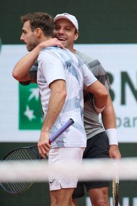 (240605) -- PARIS, June 5, 2024 -- Marcel Granollers (L) Horacio Zeballos celebrate after winning the men s doubles quarterfinal match between Zhang Zhizhen (China) Tomas Machac (Czech Republic) and Marcel Granollers (Spain) Horacio Zeballos (Argentina) at the French Open tennis tournament at Roland Garros in Paris, France, June 5, 2024. ) (SP)FRANCE-PARIS-TENNIS-FRENCH OPEN-MEN S DOUBLES MengxDingbo 