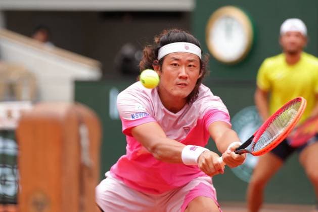 5th June 2024; Roland Garros, Paris, France; 2024 French Open Tennis tournament, Day 11; Zhizhen Zhang (CHN) at the net and Tomas Machac (CZE) in their match against Marcel Granollers (ESP) and Horacio Zeballos (ARG)  ActionPlus12651021 JonxBromley